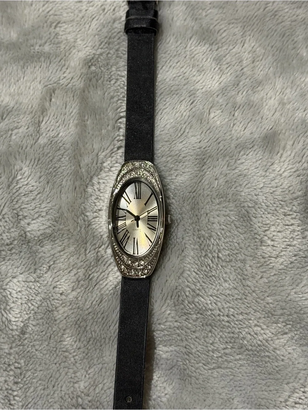 Slim Oval Silver Dial Watch with Black Strap